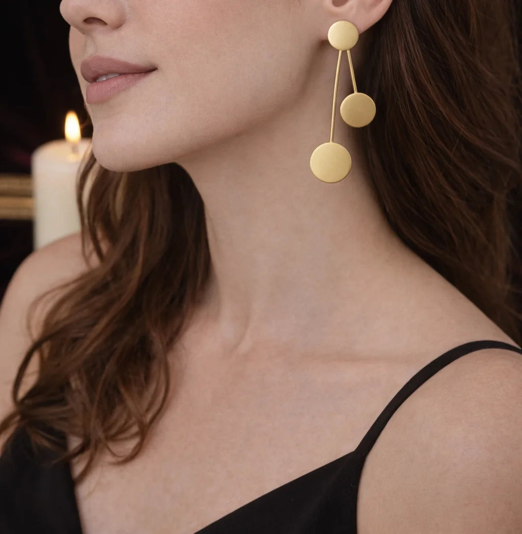 Gold-tone drop earrings with three dangling round discs