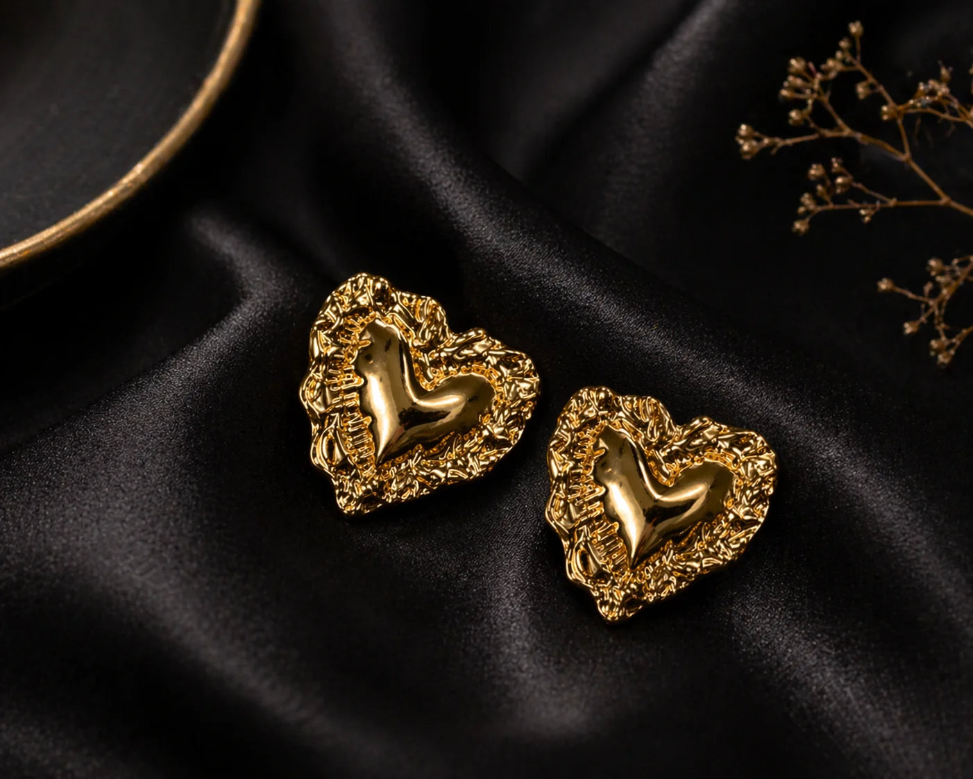 Pair of gold-tone heart pop stud earrings with raised bird motif