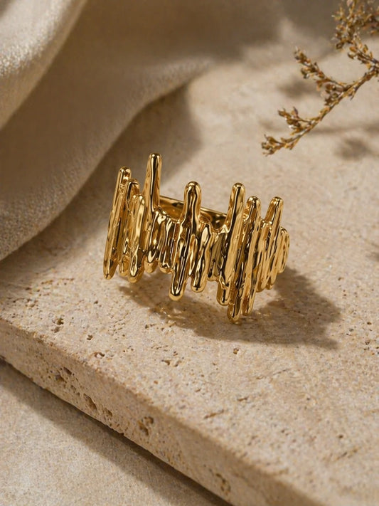 Gold ribbed wave statement ring, wide band