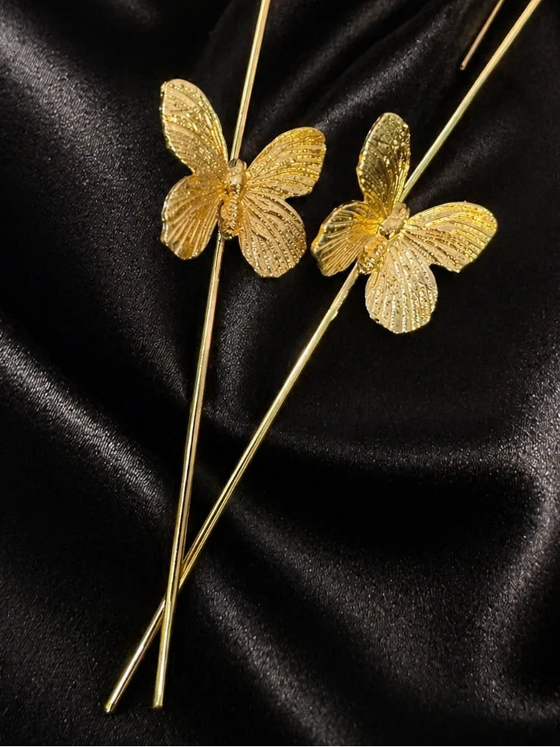 Butterfly bloom ear cuffs with textured gold butterfly charms on slim hooks