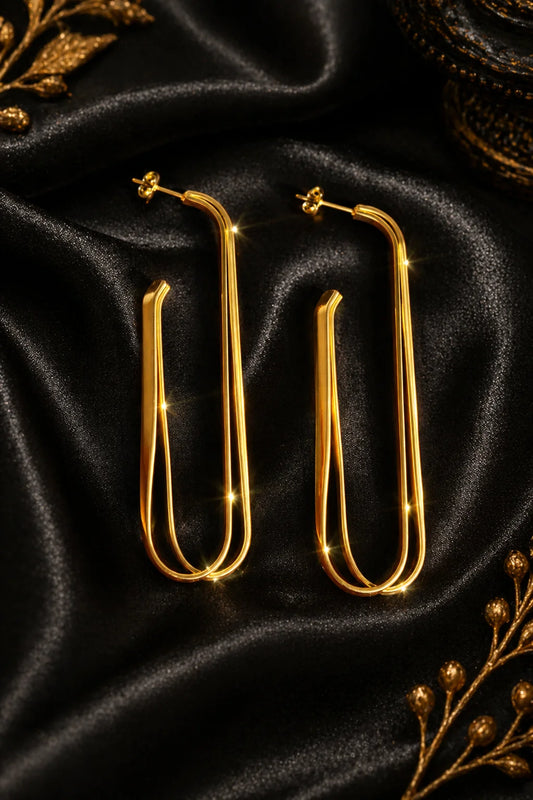 Gold-plated symmetrical double hoop earrings with small stud details