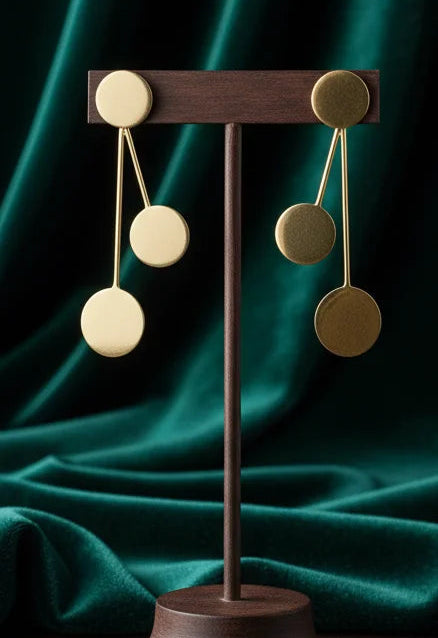 Gold-tone orbit drop earrings with multiple round discs connected by thin bars