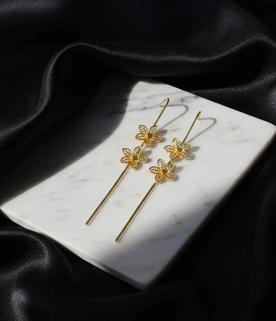 Gold-tone handmade floral ear cuffs with small dangling flower charms