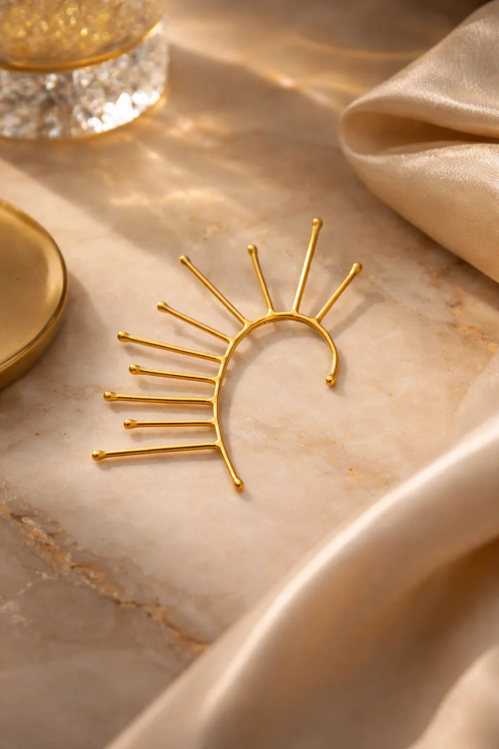 Gold spiked one-side ear cuff with sunburst needle design