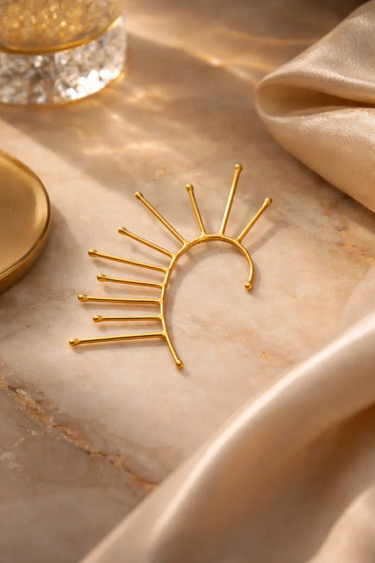 Gold spiked one-side ear cuff with sunburst needle design
