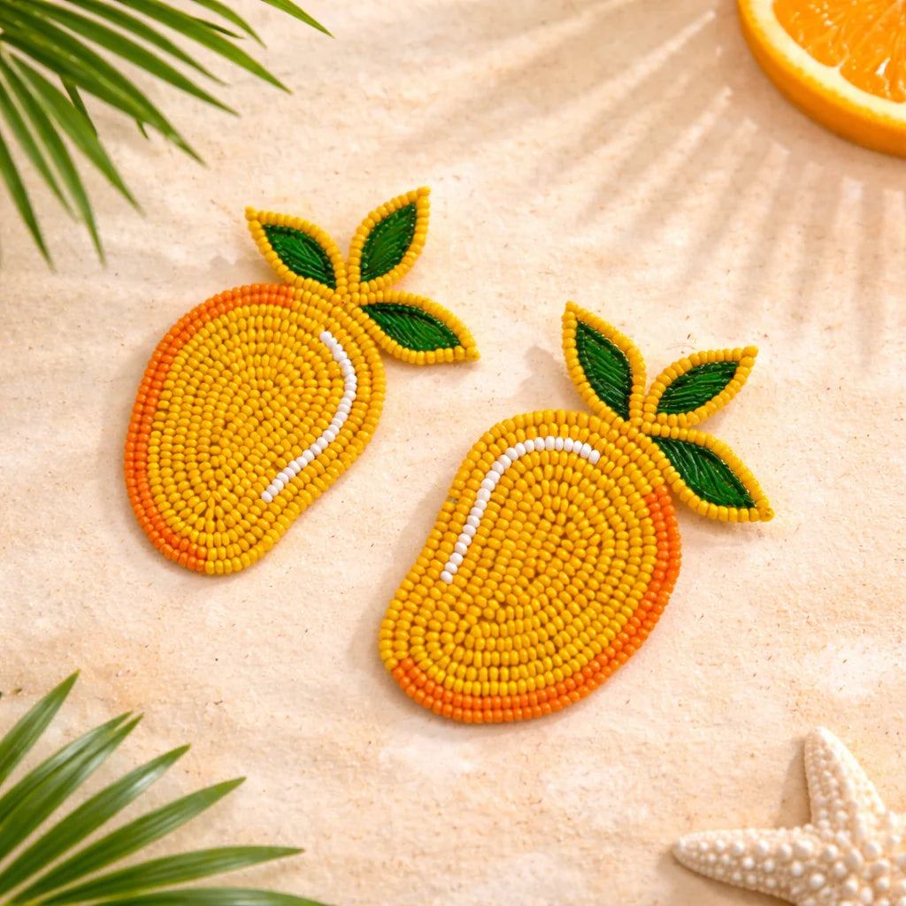 Beaded mango earrings, yellow-orange beads with green leaf accents