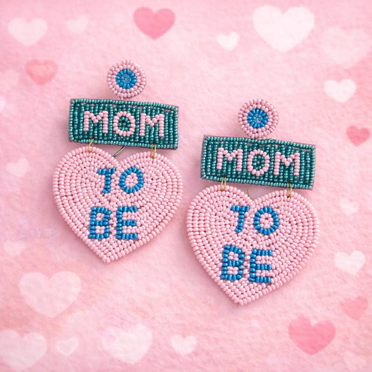 Beaded heart dangle earrings with turquoise bar and pink heart design, blue lettering