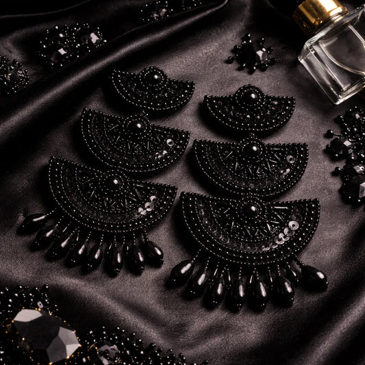 Black beaded long earrings with layered semicircle drops and dangling teardrop beads