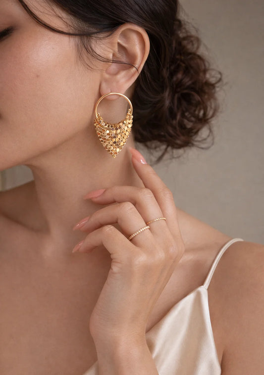 Gold triangular drape hoop earrings with dangling mesh coin fringe