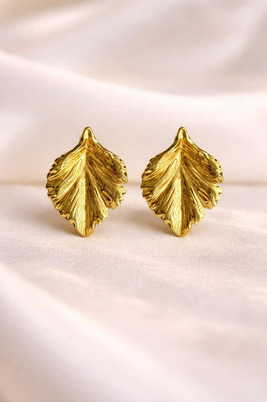 Leaf-shaped gold-tone earrings with textured veins, set of two