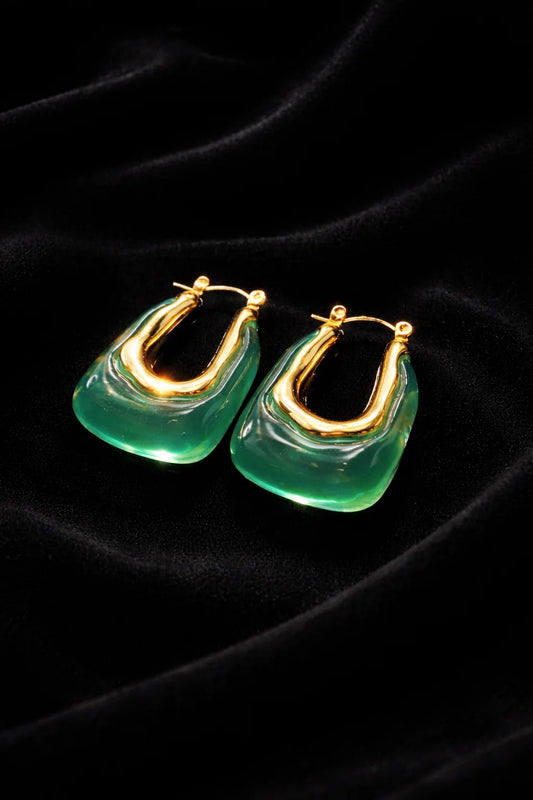 Sea Glow hoop earrings with gold-tone frames and green glass-like teardrop fronts