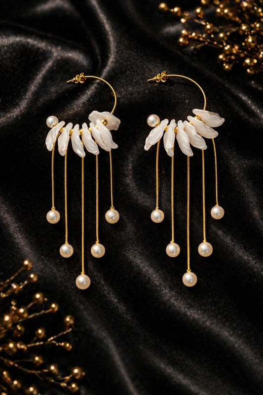 Ivory drizzle statement earrings with 18K gold-plated hoops and long pearl drops