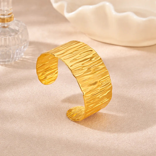 Gold hammered statement kada cuff with wavy ripple texture, wide open bracelet