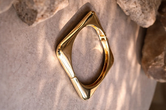 Chunky square kada bangle, glossy gold-tone with pointed-corner open frame