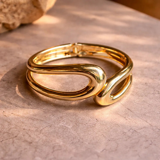 Gold chunky kada bangle with polished open oval link