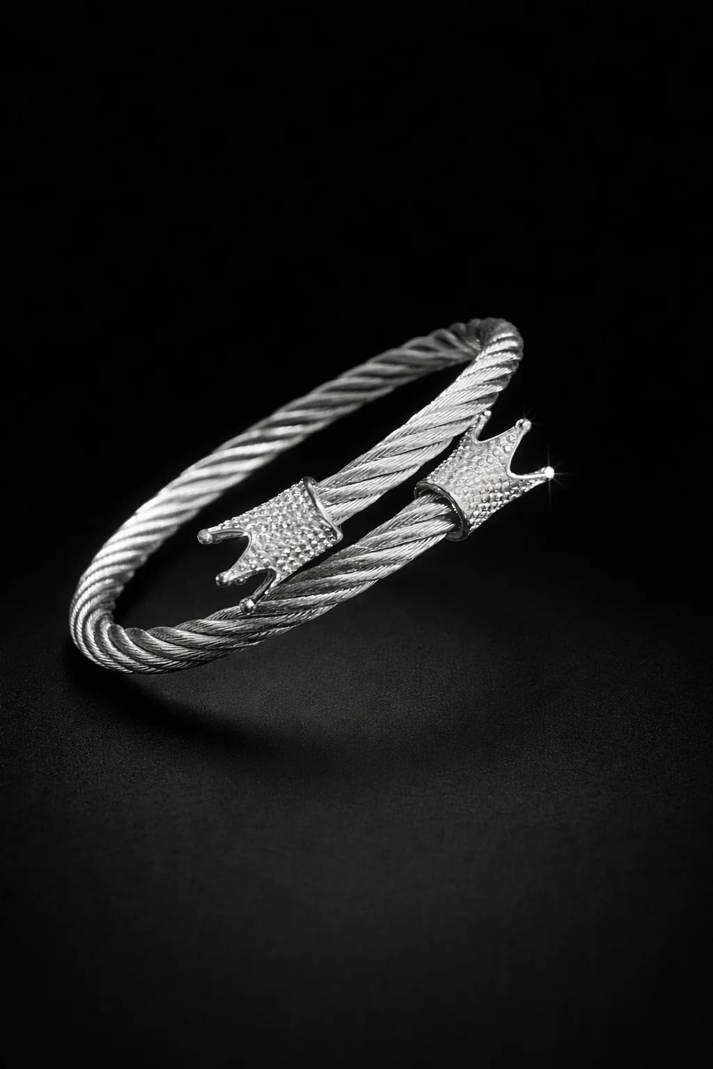 Stainless steel braided crown kada bracelet with raised crown detail and stones