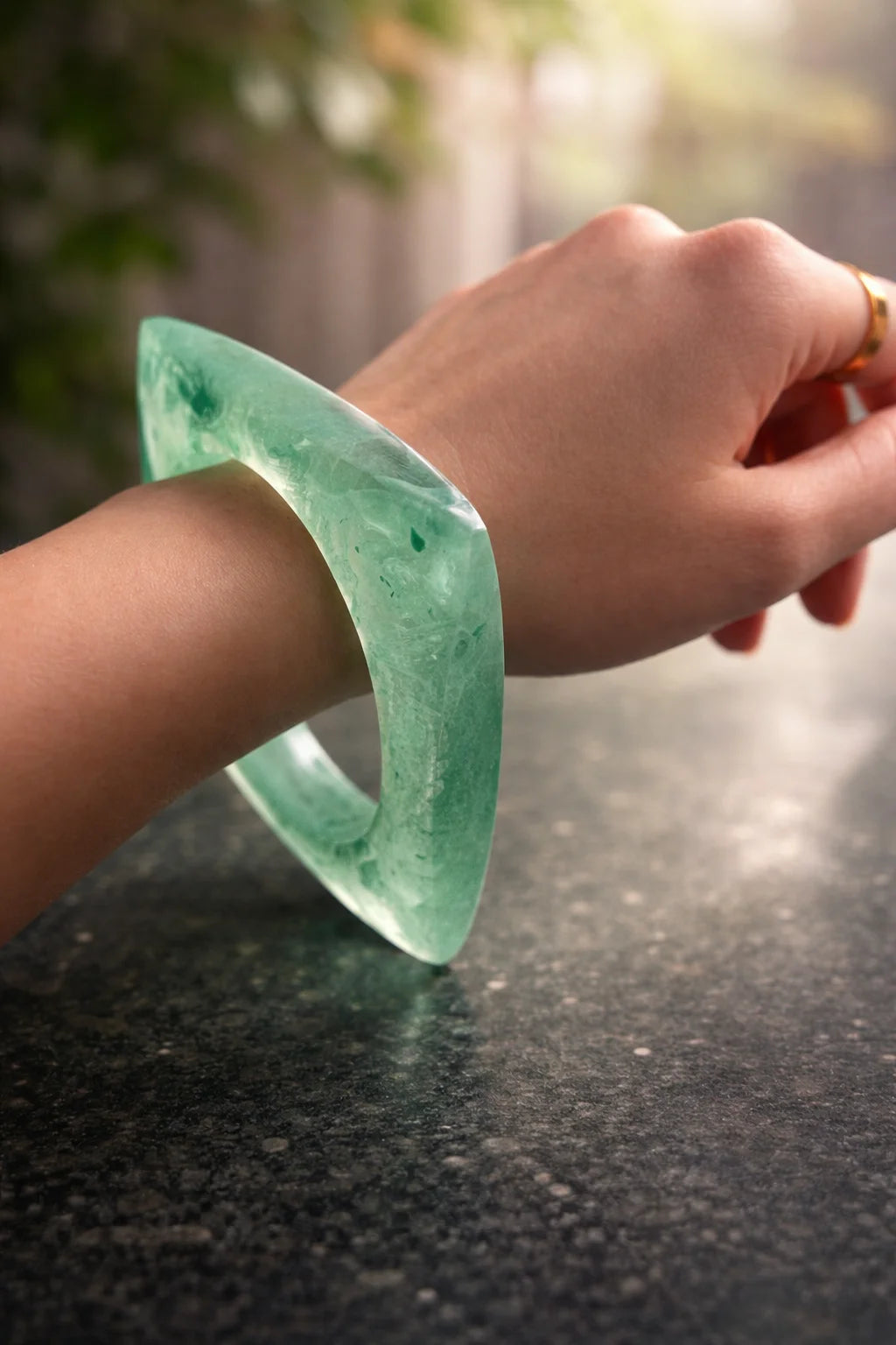 Teal resin cuff kada bracelet with curved open ring, marbled specks