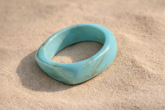 Turquoise resin bangle kada with marbled veining, wide circular bracelet