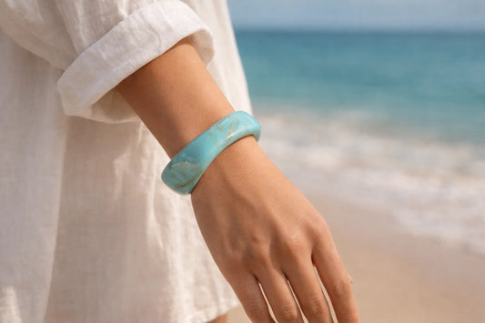 Turquoise resin bangle kada on wrist, wide marbled bracelet cuff