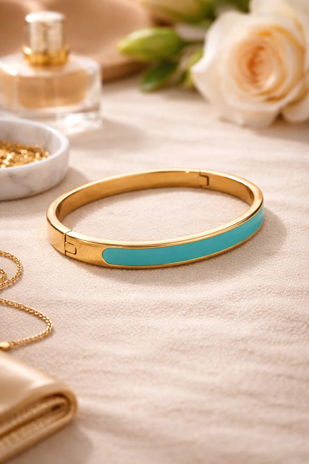 Aqua accent gold-plated kada with teal enamel stripe and hinged clasp