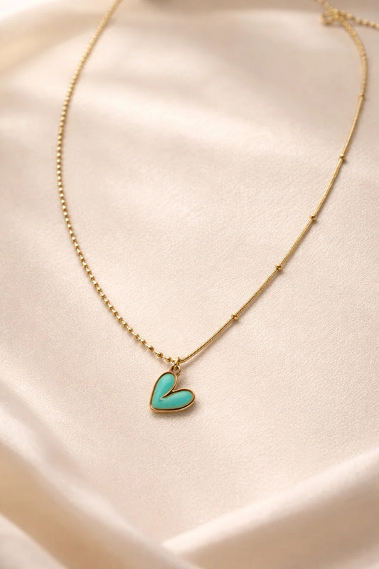 Gold-tone beaded chain with turquoise enamel heart pendant