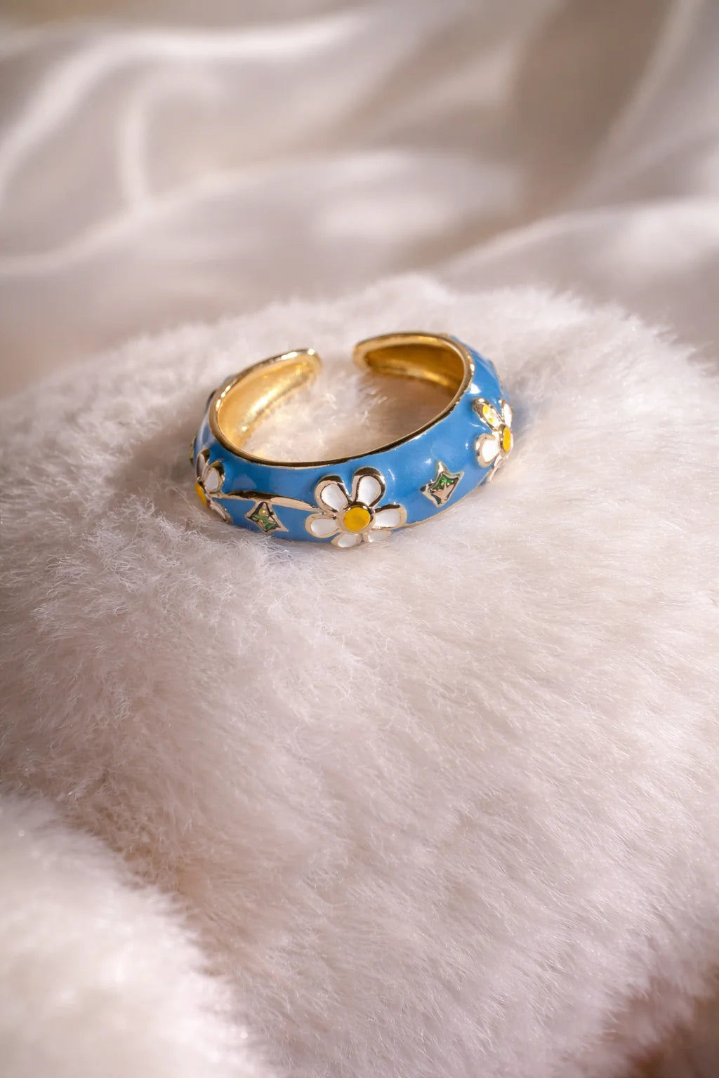 Enamel garden ring, blue enamel band with daisy flowers and gold accents
