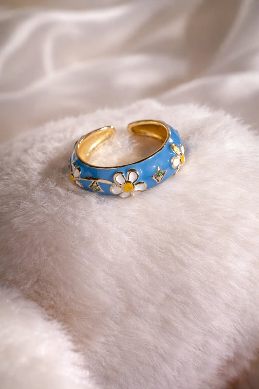 Enamel garden ring, blue enamel band with daisy flowers and gold accents