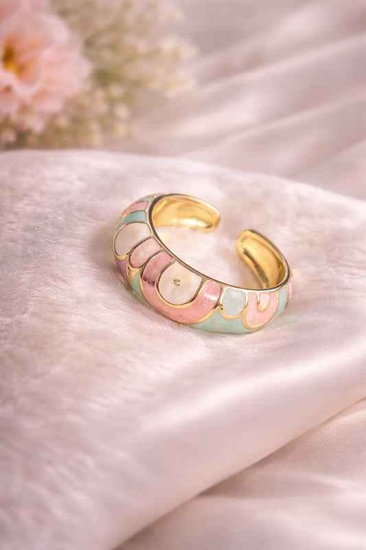Pastel enamel statement ring with gold-tone edges and scalloped band detail
