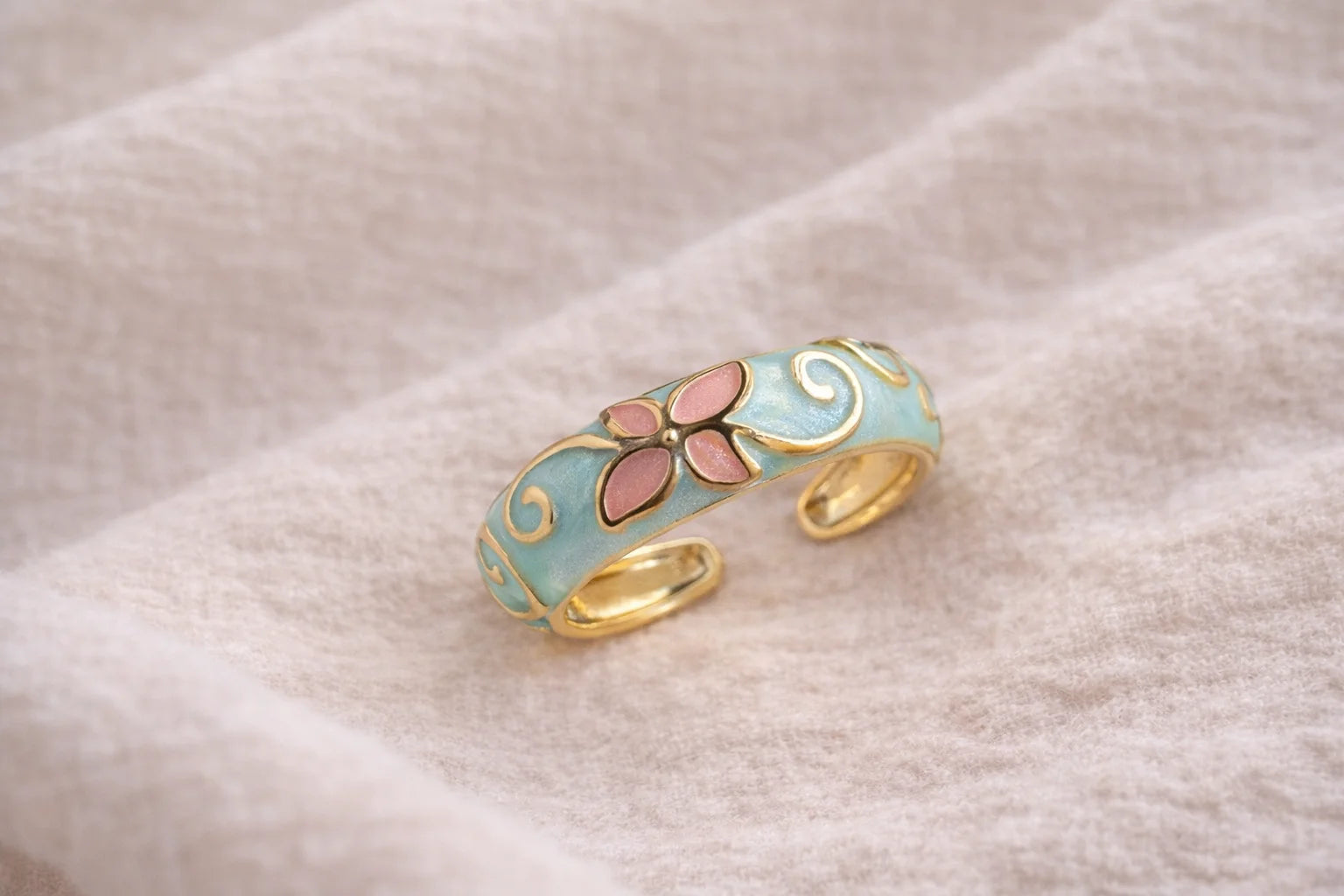 Mint enamel blossom ring with pink petal flowers and gold-tone band