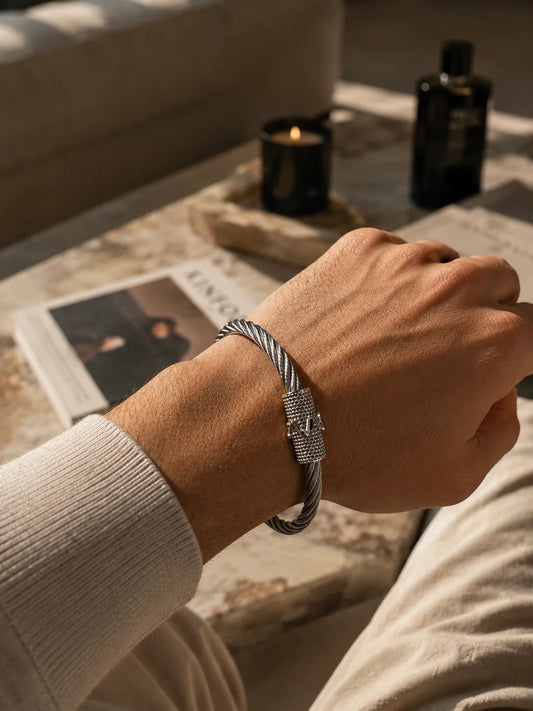 Braided stainless steel crown kada bracelet with crown centerpiece on wrist