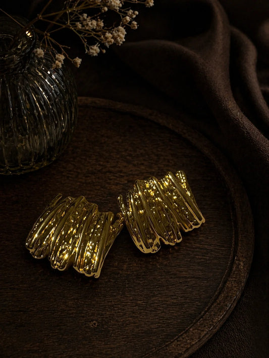 Pair of gold-plated stack stud earrings with ribbed stacked bands