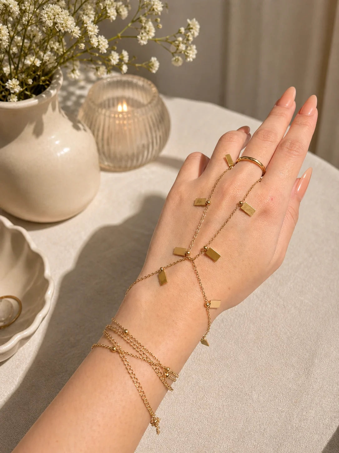 18K gold-plated multi-wear chain bracelets with square and bar charms on hand